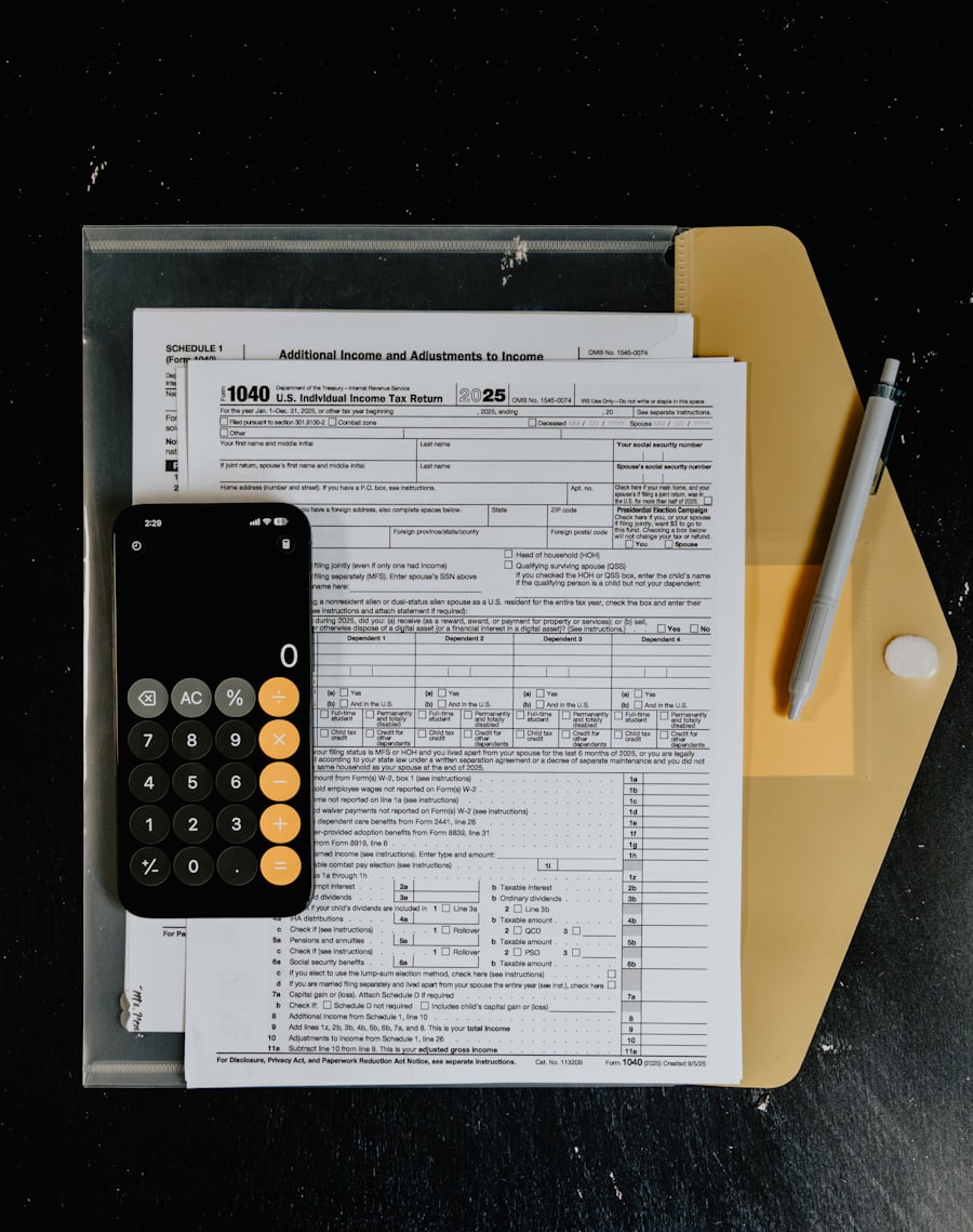 Property tax forms with a calculator and pen on a desk